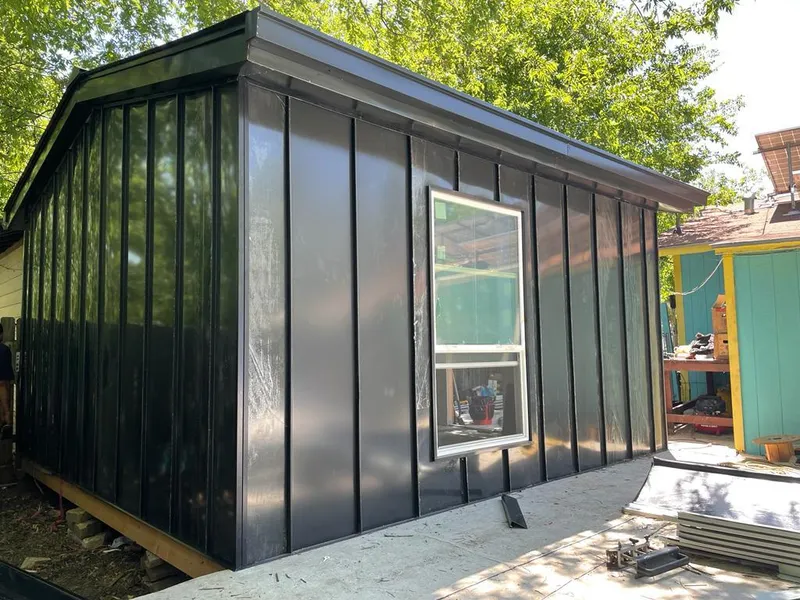 Black standing seam metal wall panels for Roof Inspection in Bainbridge